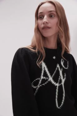 Betsy Logo Jumper -Aje 23SS1293 BLK IVRY 4 a68244de d0e6 4f6b bb7b 38f43c9ceed1