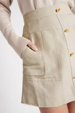 Evermore Mini Skirt -Aje S26 EvermoreMiniSkirt 22SU4179 STONE 22036 Aje 1071 detailshot