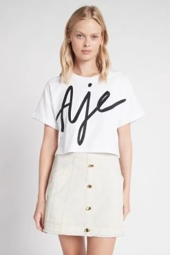 Camellia Denim Mini Skirt -Aje S27 CamelliaDenimMiniSkirt 22SU4103 WHITE 22036 Aje 19668 frontshot