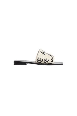 Anais Logo Slide -Aje S52 22SU7004 ANAISAJEWEBBINGSLIDE BLACK NATURALSANDAL BLACK 21650 Aje 6739 fullshot 1365x 7537a64b 3ed6 47dd 969e 186426d9d6c0